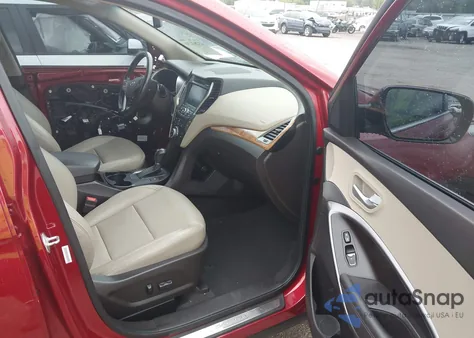 2014 Hyundai Santa Fe Sport 2.4L z USA, uszkodzony, nr VIN 5XYZUDLBXEG170657